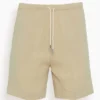 Toteme Press-Creased Drawstring Shorts In Overcast Beige
