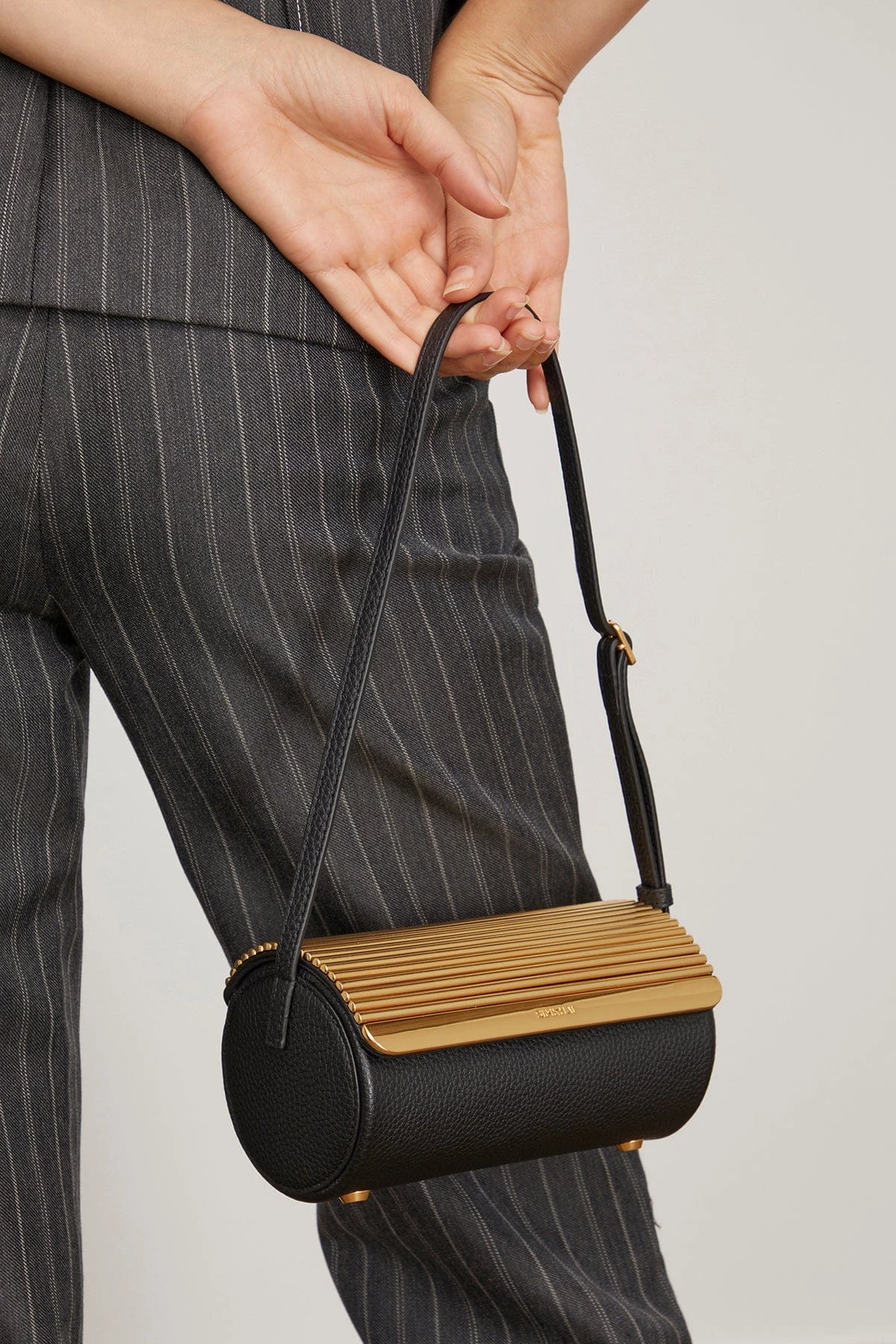 Rola Cylinder Metal Shoulder Bag In Black - Image 2